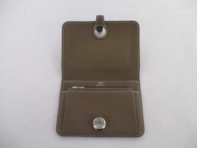 Shop HERMES Dogon compact wallet (H066382CK9R) by IFME_AK